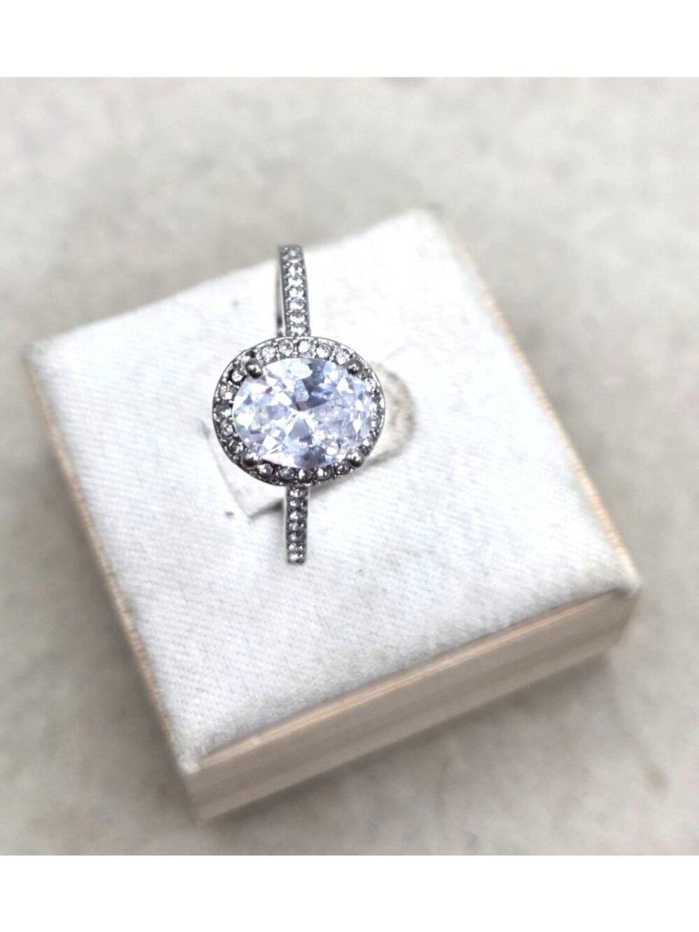 Oval Shape Faux Diamond Solitaire RIng With CZ Accents Size - 10